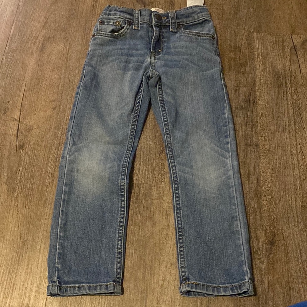 *5 for $15* Levi’s jeans